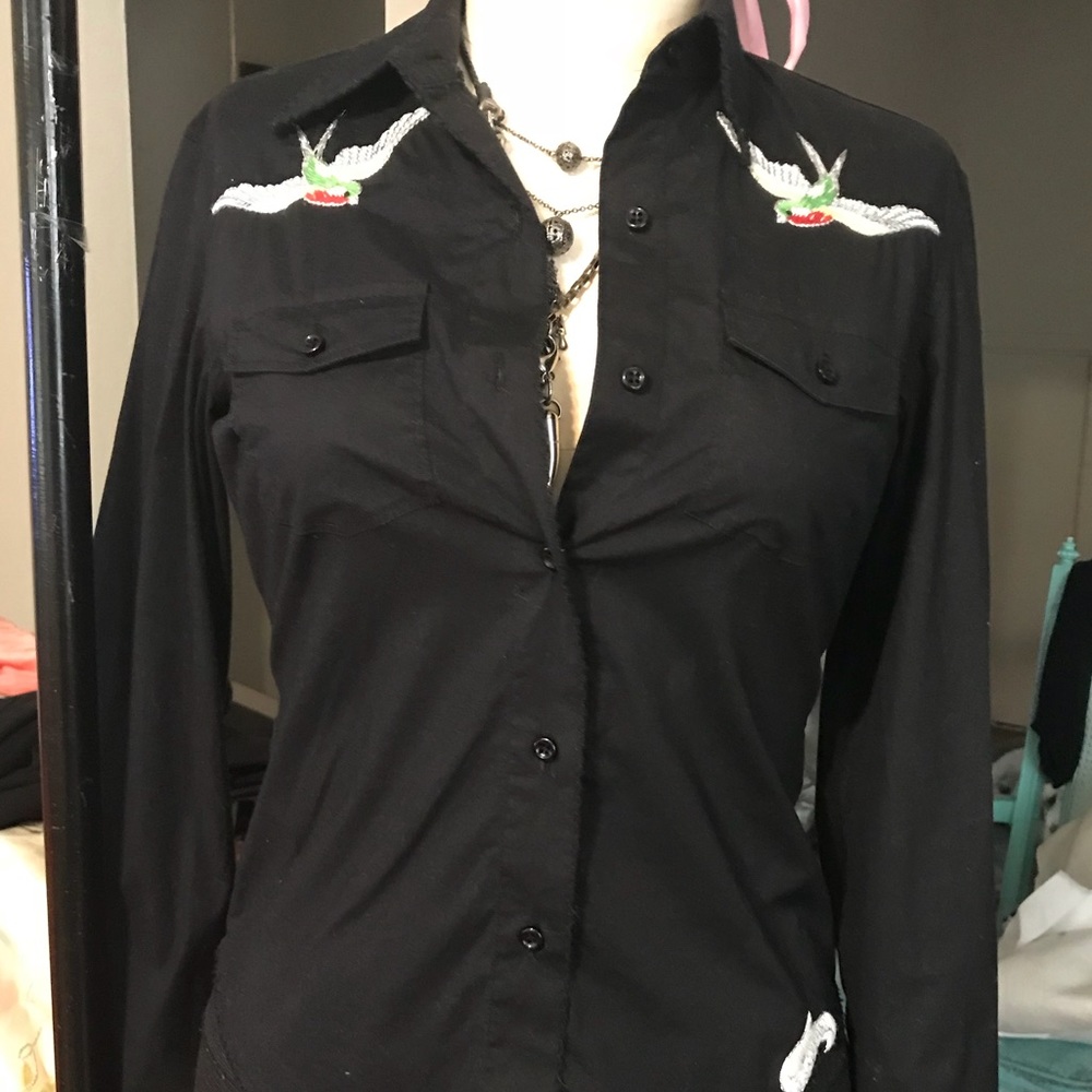 black  shirt with beautiful bird appliqué